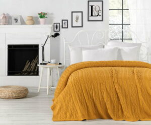 Hořčicově žlutý přehoz přes postel Knit