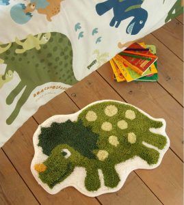 Zelený dětský koberec s motivem dinosaura Catherine Lansfield